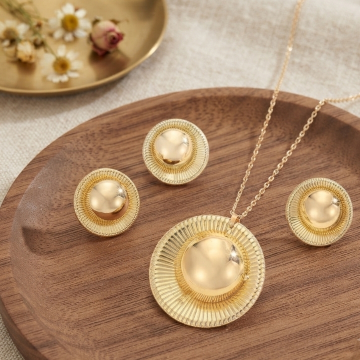 Gilded Sunburst Dome Jewelry Set